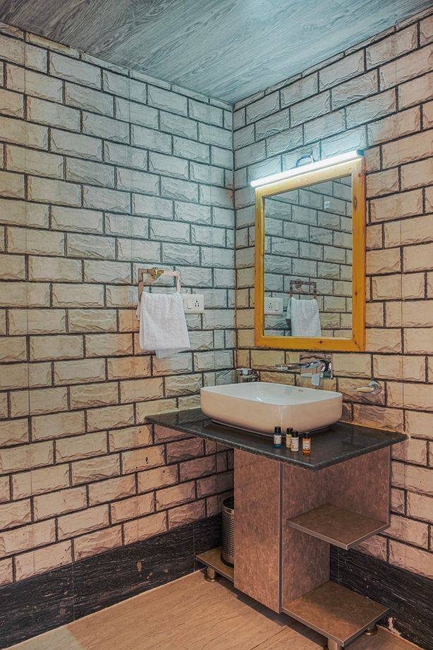 Bathroom with framed mirror