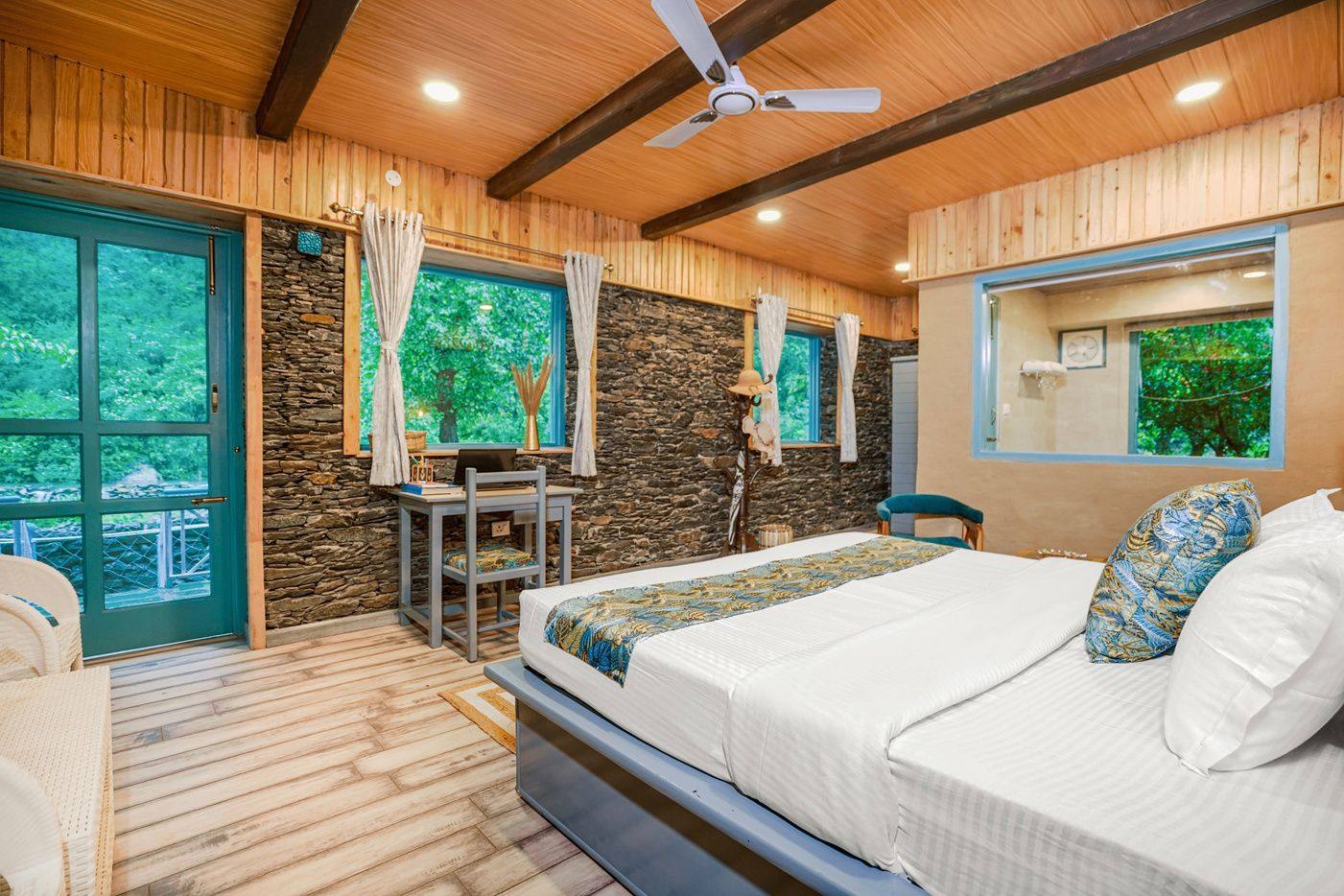 Luxury room with timber ceiling and river window